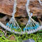 twin tree trunks decorated with 4mm sky blue glass beads